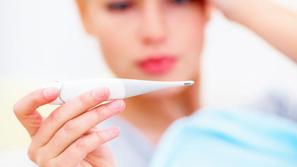Povišana telesna temperatura je značilna za gripo. (Foto: Shutterstock)