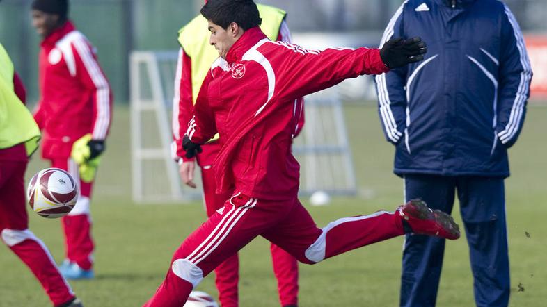 Martin Jol (v ozadju desno) pri Ajaxu vodi novo talentirano generacijo na čelu z