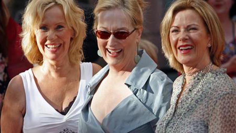 Pevki skupine ABBA Agnetha Faltskog (levo) and Frida Reuss (desno) sta ne premie