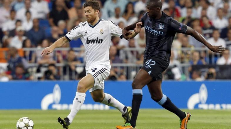 Xabi Alonso Yaya Toure Real Madrid Manchester City Liga prvakov