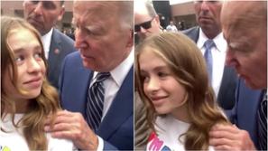 Joe Biden prišepne dekletu