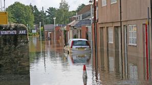 Nekatera mesta so povsem poplavljena. (Foto: AFP)