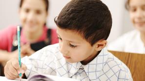 otrok pisanje šola test