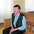 Janez Smolič na zatožni klopi zaradi poskusa uboja svojega pastorka. (Foto: Jerc