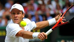 Wimbledonski finalist Berdych se je poslovil v četrtfinali turnirja v Washington