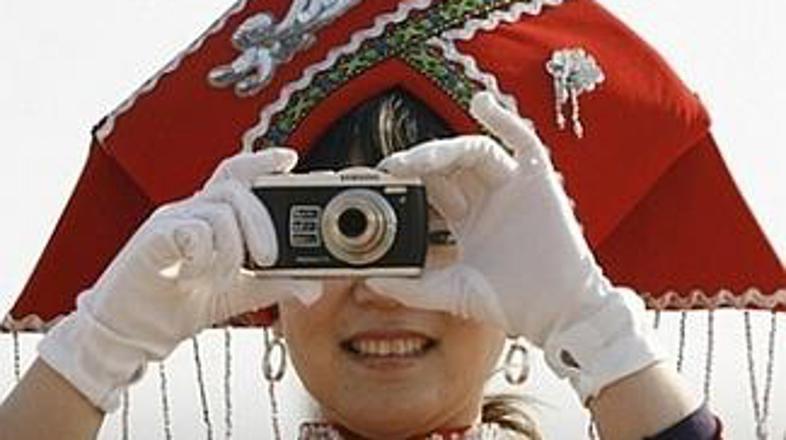 Kitajci želijo hostese, ki jih bodo svetu predstavile v najlepši luči. Velike za