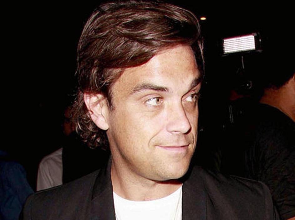 Policija se je z Robbiejem pogovorila. Pevec naj ne bi bil osumljenec.