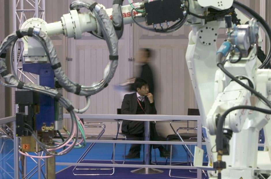 Roboti v proizvodnji | Avtor: EPA