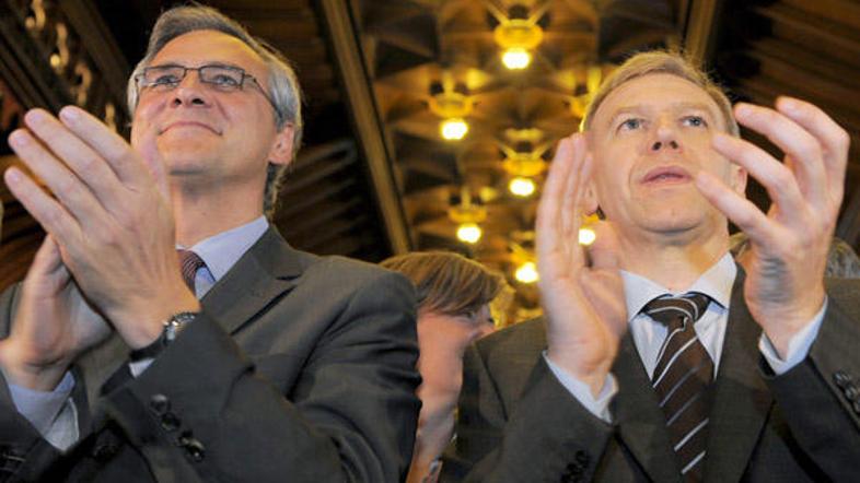 Flamski ministrski predsednik Kris Peeters (L) in premier Yves Leterme (D)