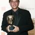 Nagrado za najboljši scenarij po predlogi je prejel Aaron Sorkin za film Socialn