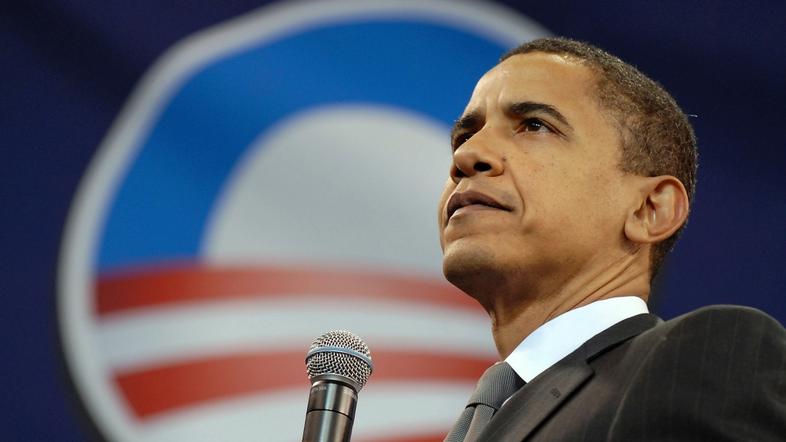 US Democratic presidential candidate Senator Barack Obama (D-IL) pauses while ad