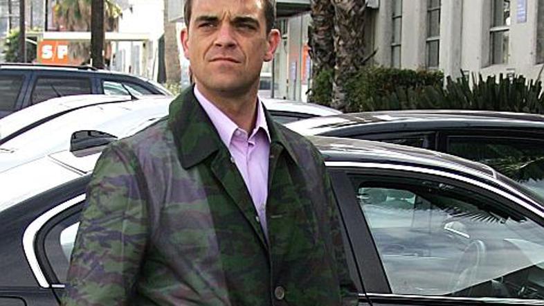 Robbie je bil nekaj let paradni konj založbe EMI, zdaj pa napoveduje, da bo stav