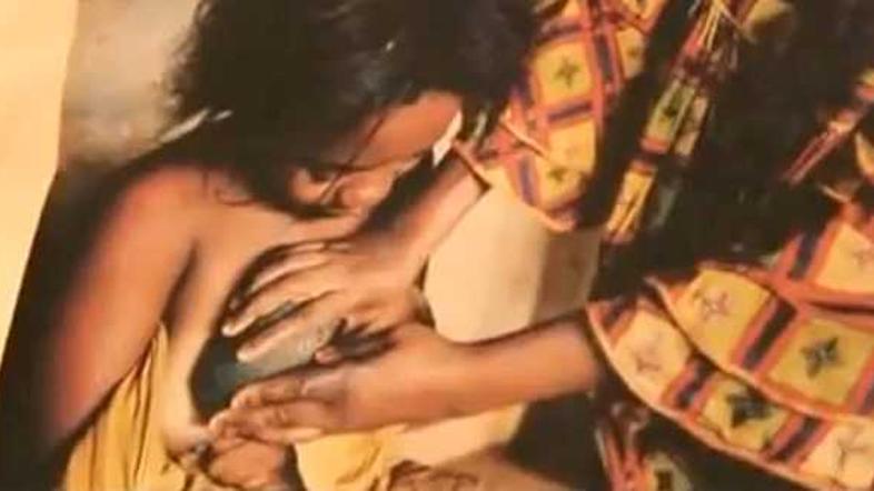 Polaganje vročih kamnov na deklico. (Foto: Current TV)