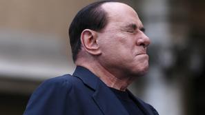 razno 27.11.13. Former Italian Prime Minister Silvio Berlusconi closes his eyes 