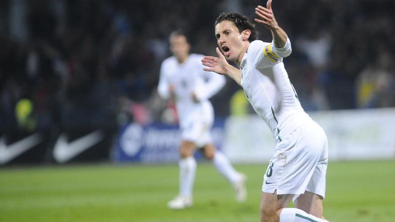 Robert Koren, ko se je s soigralci veselil uvrstitve na SP 2010. (Foto: Fotosi)