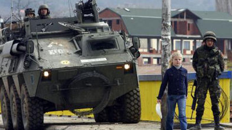 Španski vojaki končujejo svojo misijo.