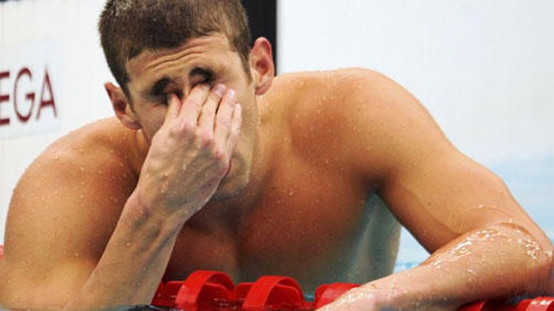Čeprav je napovedal rekordno bero kolajn, Michael Phelps ni mogel zadržati solz.