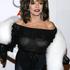 Joan Collins
