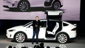 Elon Musk in tesla model X