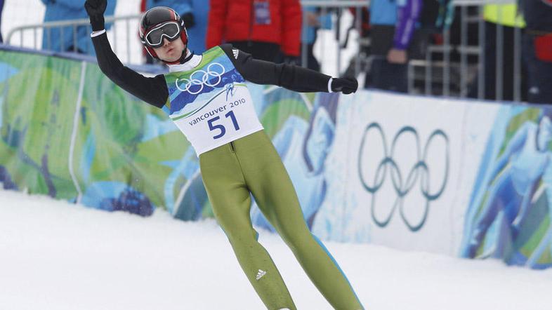 Zmagovalec Simon Ammann. (Foto: Reuters)