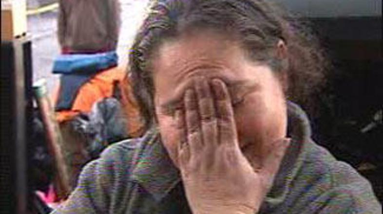 "Tvegala sem, saj so ognjeni plameni grozili, da nas bodo zajeli," je vsa solzna