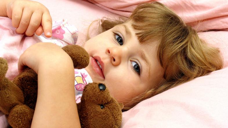 Otroka na spanje navajajte že čez dan. (Foto: Shutterstock)
