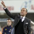 Pep Guardiola je le s težavo v sredo vodil svoje fante v Valencii. (Foto: Reuter
