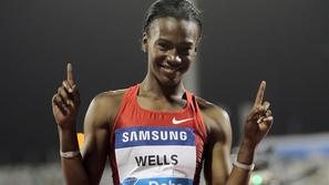 Američanka Kellie Wells je slavila na 100 metrov z ovirami. (Foto: Reuters)