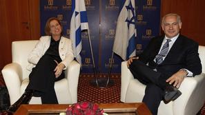 Netanjahu (na fotografiji desno) bo najverjetneje v novi vladi sedel z ministri 