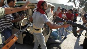 Libijski uporniki v Gadafijevi trdnjavi