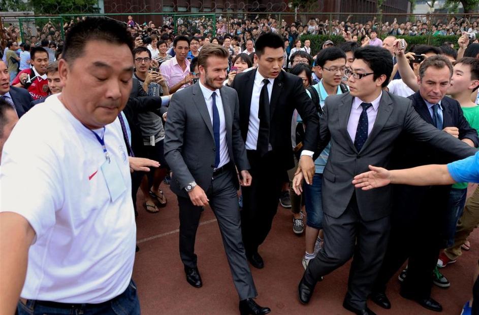 Univerza Tongji Kitajska Šanghaj David Beckham kaos stampedo incident