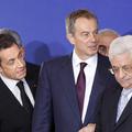 Tony Blair (v sredini) je že 11 mesecev v funkciji odposlanca držav za Bližnji v