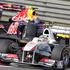 Sergio Perez (Sauber) in Mark Webber (Red Bull)