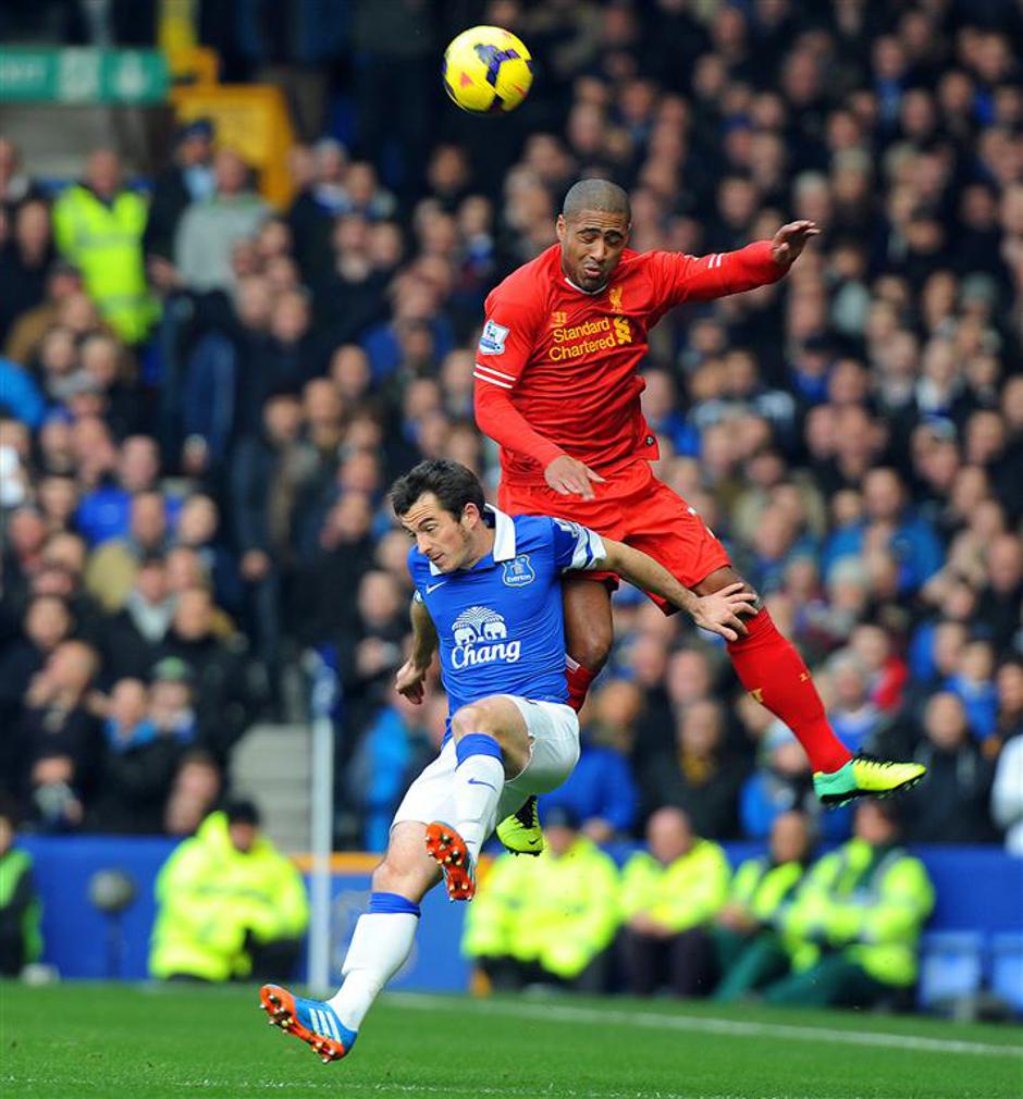 Baines Johnson Everton Liverpool Premier League Anglija liga prvenstvo | Avtor: EPA