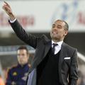 Pep Guardiola je le s težavo v sredo vodil svoje fante v Valencii. (Foto: Reuter
