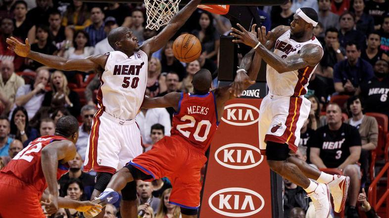 Joel Anthony, LeBron James in Jodie Meeks 
