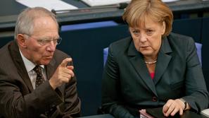 Wolfgang Schäuble in Angela Merkel.