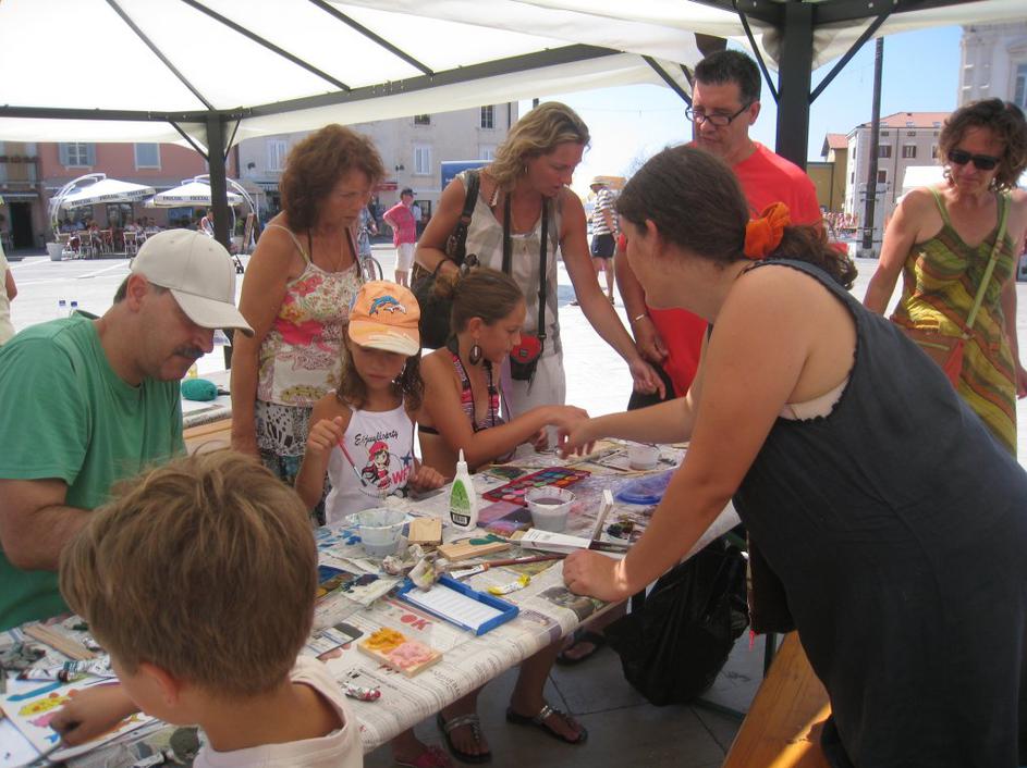 Dan delfinov v Piranu