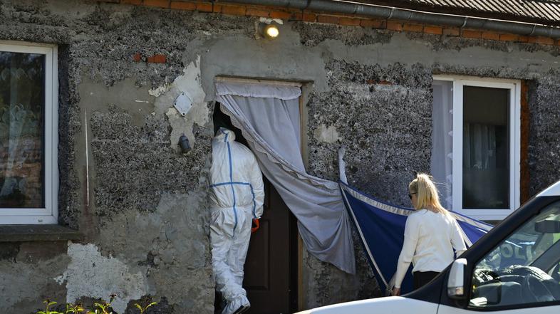 hiša groze na Poljskem, kjer so našli trupla novorojenčkov