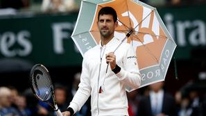 Novak Đoković OP Francije dež