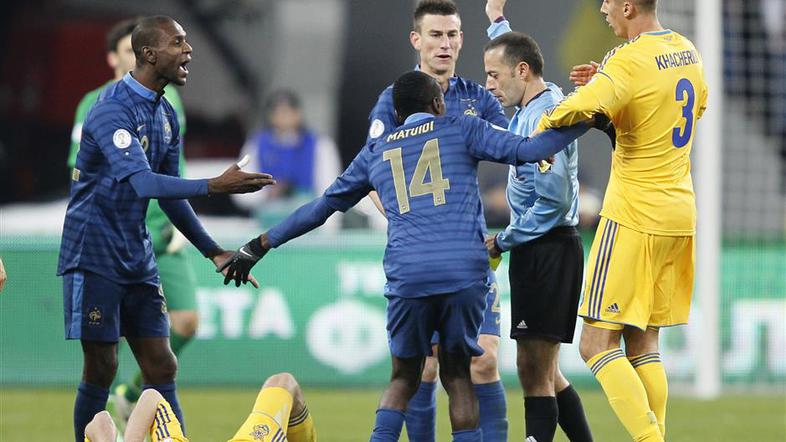 Koscielny Kučer Kucher Cakir Ukrajina Francija dodatne kvalifikacije Kijev Abida