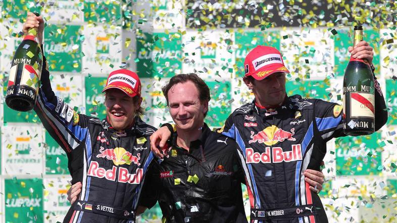 Vettel, Horner in Webber so se veselili prvega naslova med ekipami. (Foto: Reute