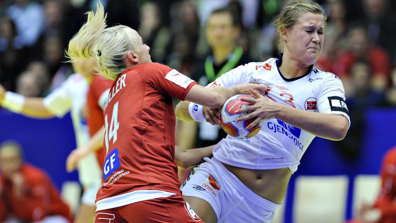 Danke v rdečih dresih niso mogle ustaviti Romunk. (Foto: Reuters)