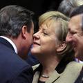 Britain's Prime Minister Cameron greets Germany's Chancellor Merkel while EC Pre