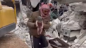 novorojenček Sirija ruševine potres