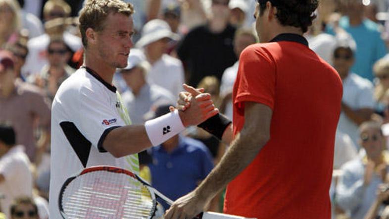 Lleyton Hewitt je proti Rogerju Federerju dobil prvi niz, nato izgubil naslednje