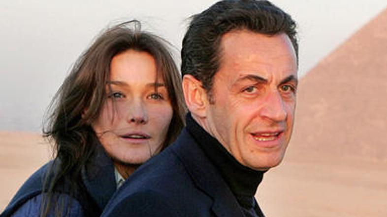 Nicolas Sarkozy z ženo Carlo Bruni FOTO: AFP