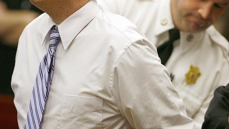 Riley med izrekom sodbe ni kazal nobenih čustev. (Foto: AP)