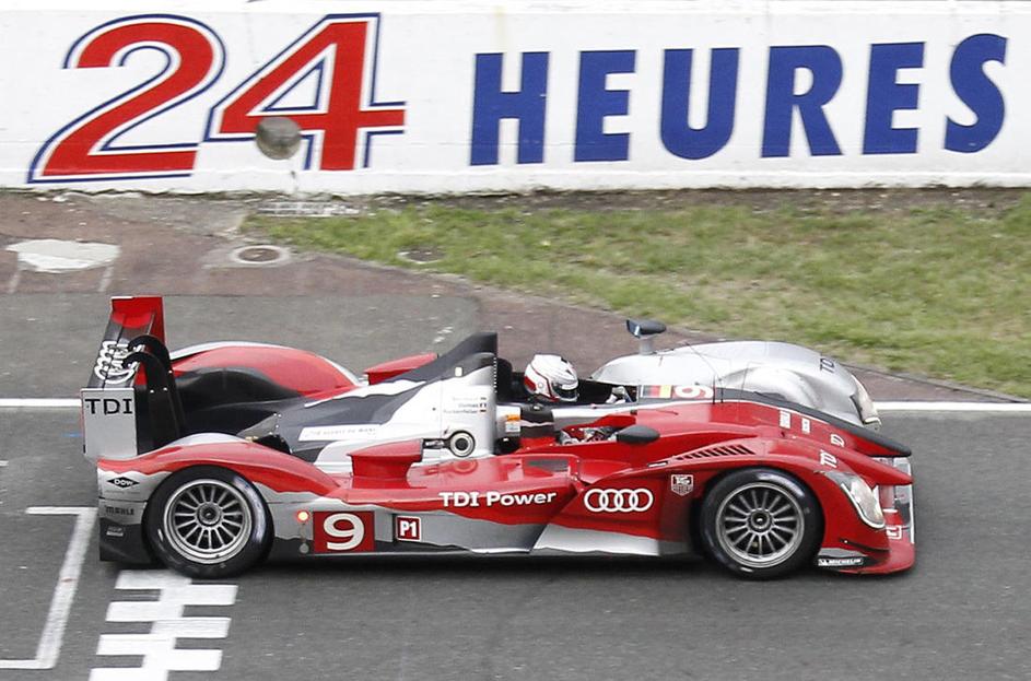 Mike Rockenfeller,Timo Bernhard in Romain Dumas so osvojili Le Mans. (Foto: Reut