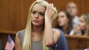 Lindsay je zaprta poleg 19-letnice, ki jo je okradla. (Foto: Reuters)